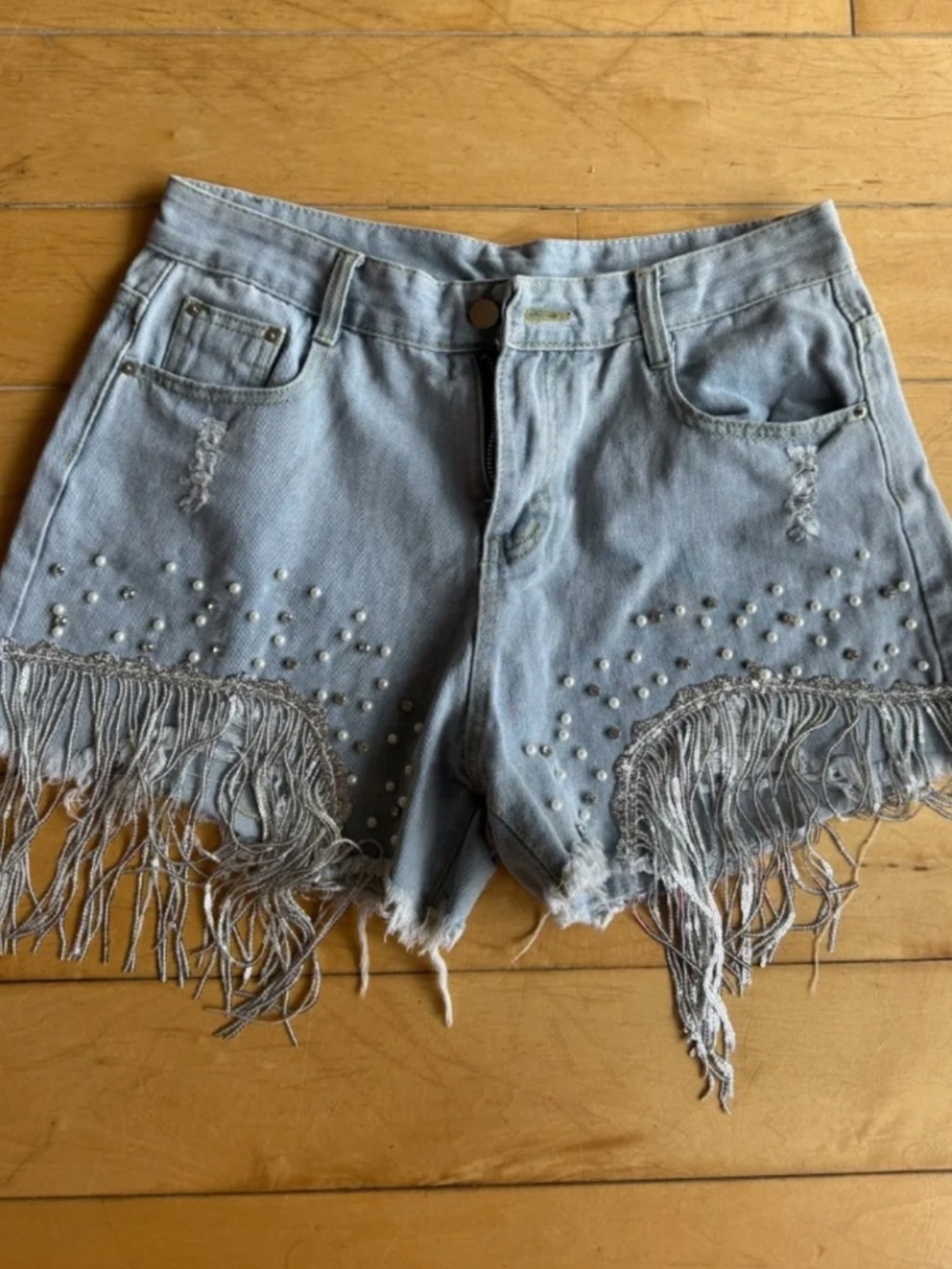High wasted denim shorts with glitter and pearls